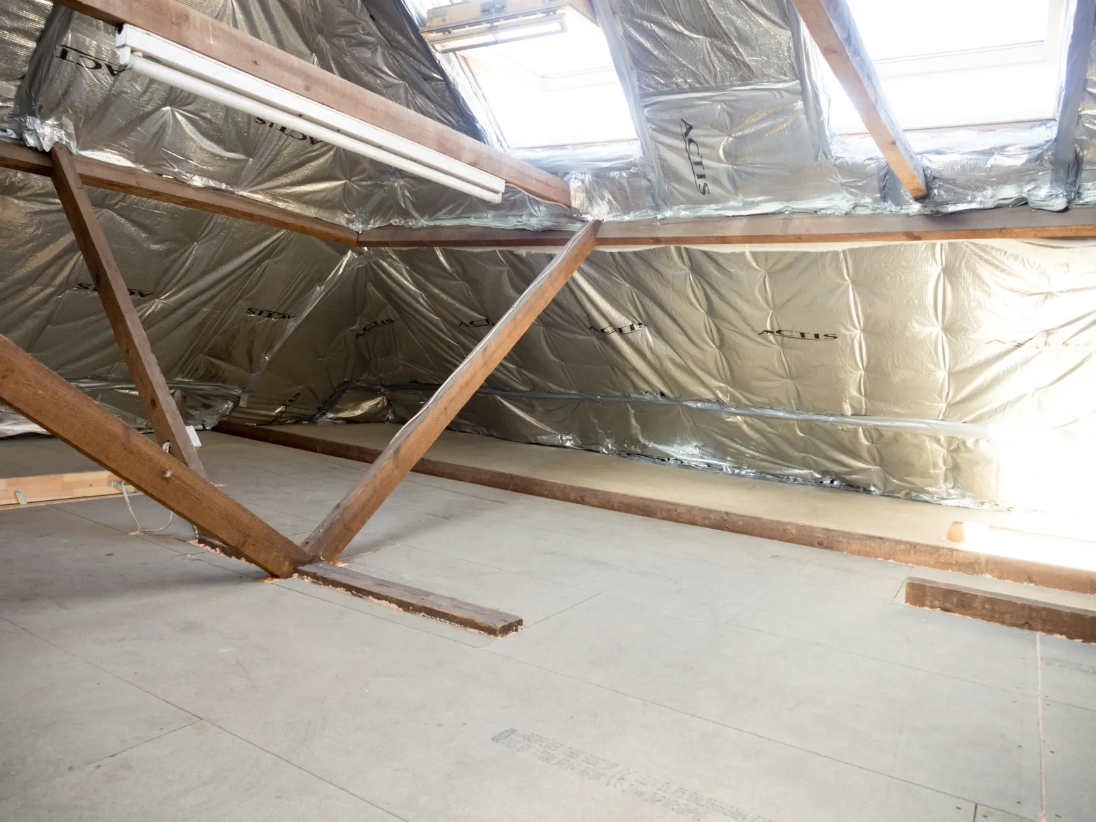 Attic cleanup and restoration work in progress