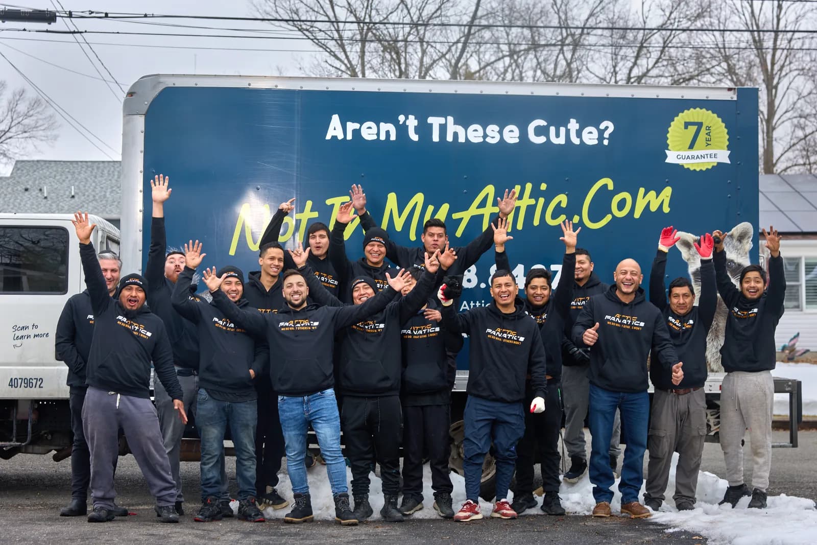 Full Attic Fanatics crew celebrating a completed job