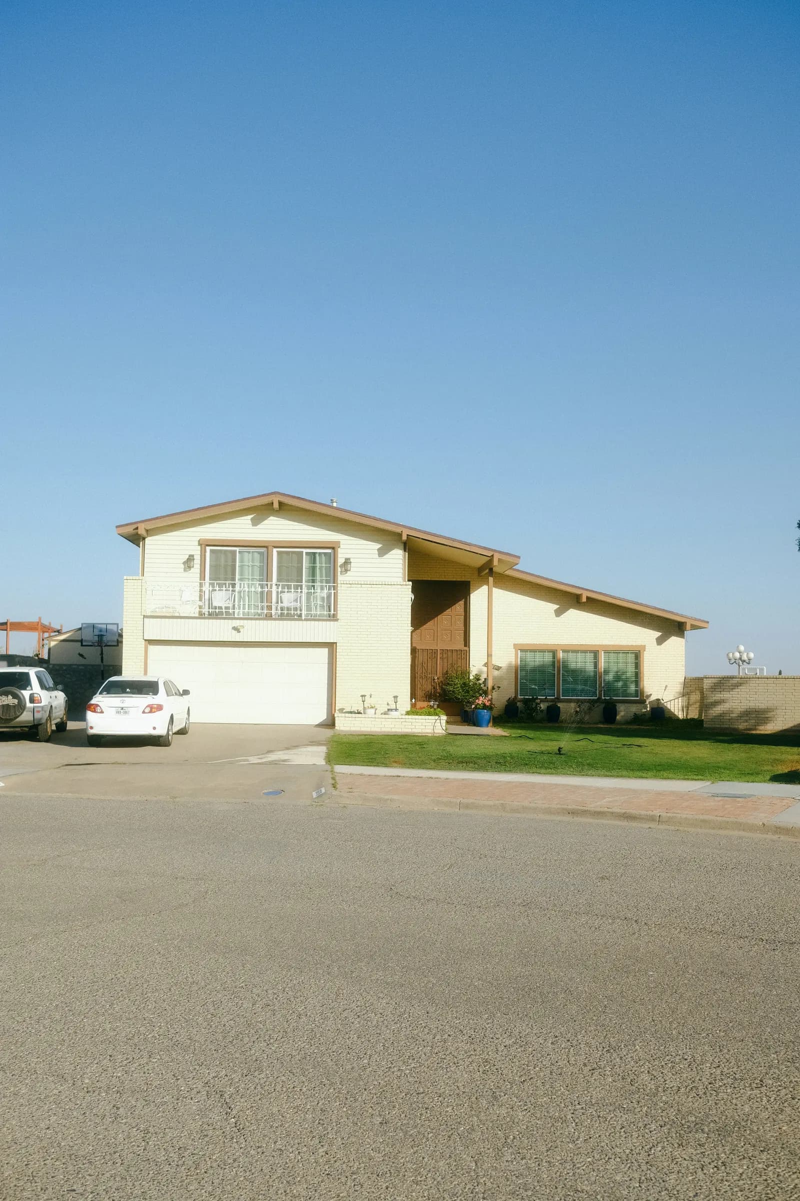 Residential exterior serviced by Attic Fanatics